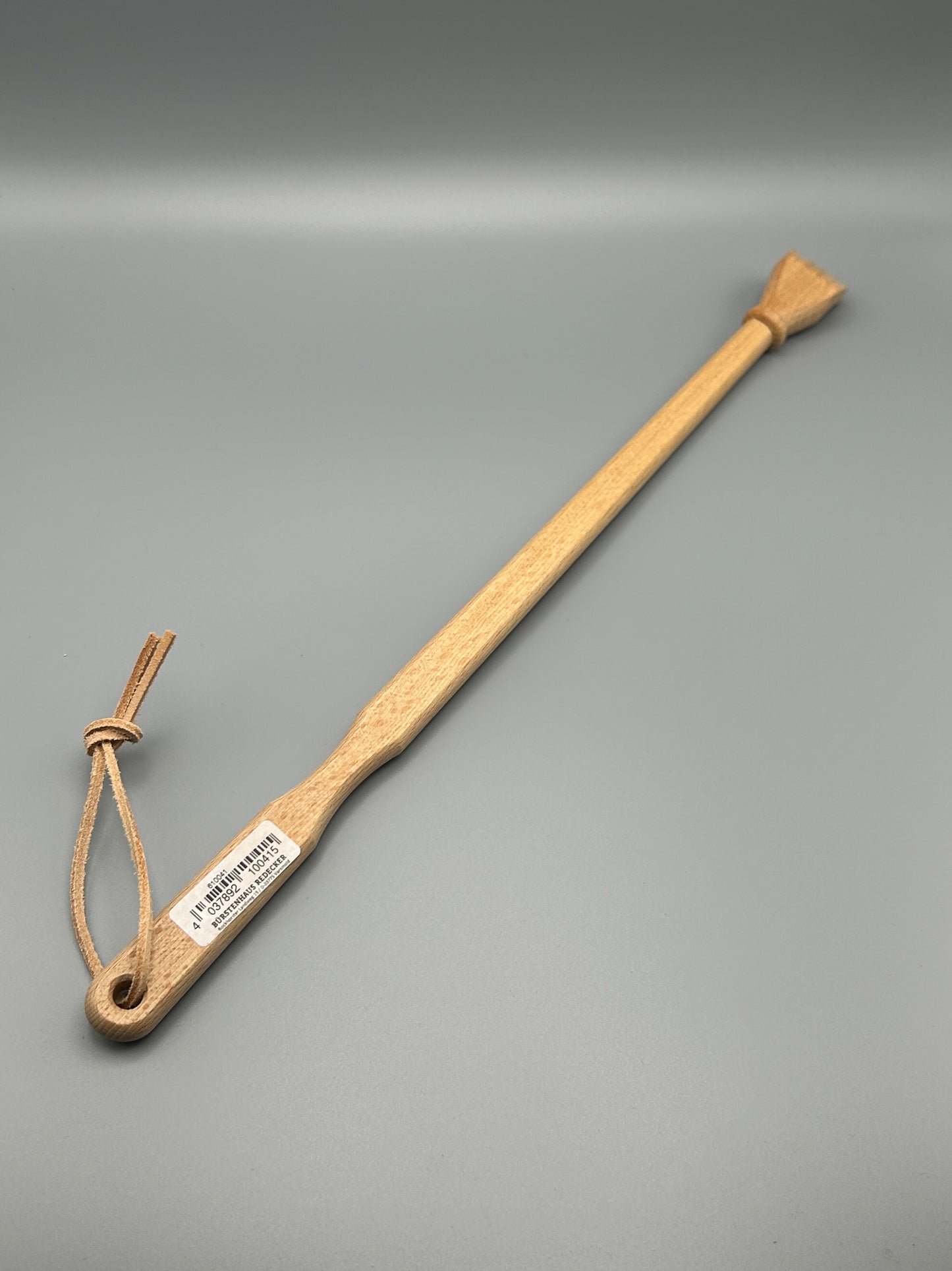 Rückenkratzer aus geöltem Buchenholz